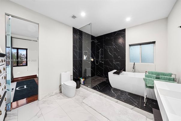 Bathroom, Free Standing Baths, Glass Shower, Interior, Marble, Marble Walls, Recessed Lighting