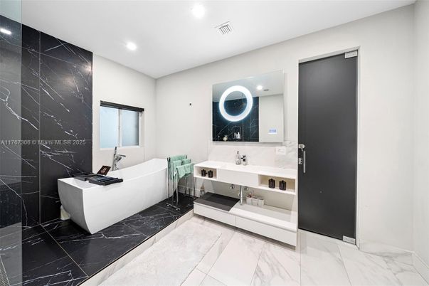 Bathroom, Dual Sink Vanities, Free Standing Baths, Interior, Marble, Marble Walls, Recessed Lighting