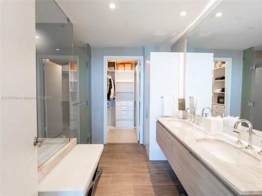 Bathroom, Dual Sink Vanities, Interior, Recessed Lighting, Walk-in Closets, Wood Texture Flooring