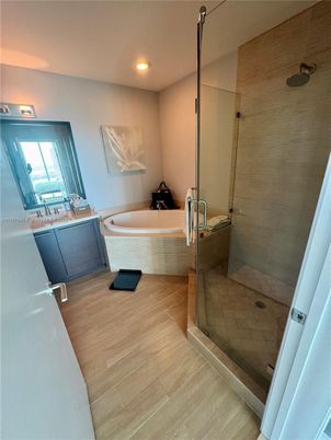 Bathroom, Glass Shower, Interior, Recessed Lighting, Wood Texture Flooring