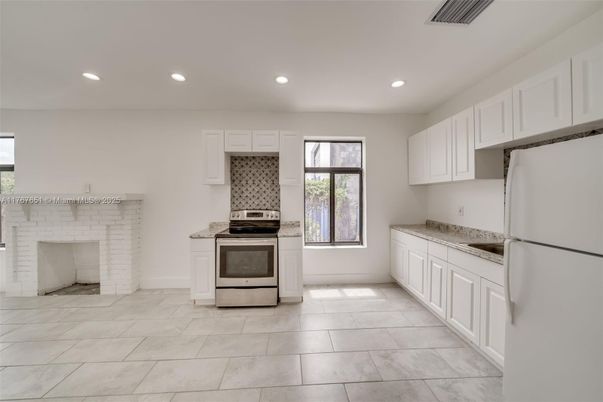 Fireplace, Interior, Kitchen, Recessed Lighting, Stainless Steel Appliances