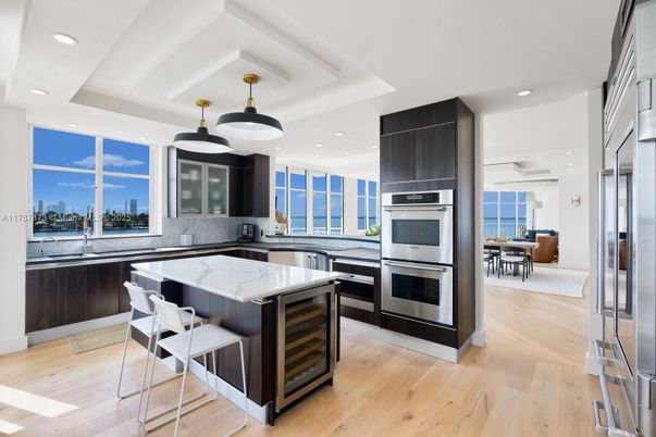 Dining room, Interior, Kitchen, Recessed Lighting, Stainless Steel Appliances, Wood Texture Flooring