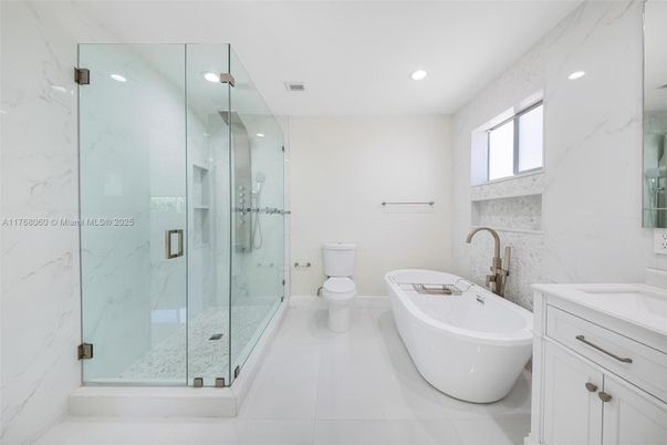 Bathroom, Free Standing Baths, Glass Shower, Interior, Marble Walls, Recessed Lighting