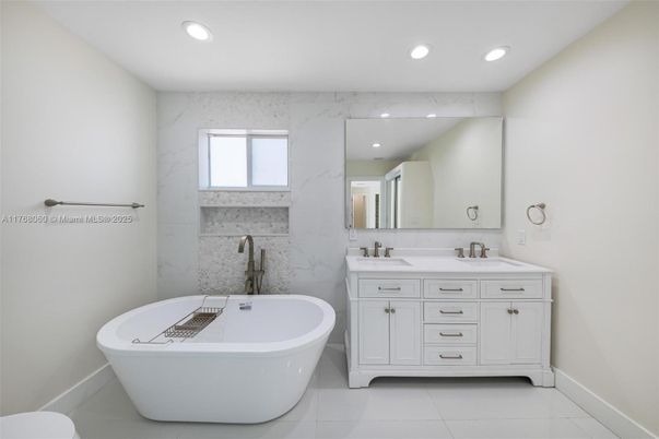 Bathroom, Dual Sink Vanities, Free Standing Baths, Interior, Marble Walls, Recessed Lighting