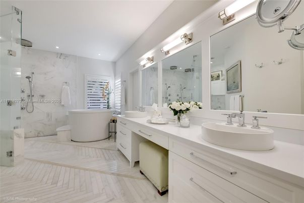 Bathroom, Dual Sink Vanities, Free Standing Baths, Glass Shower, Interior, Marble, Marble Walls, Recessed Lighting