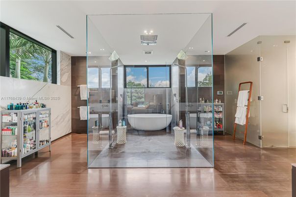 Bathroom, Free Standing Baths, Glass Shower, Interior, Recessed Lighting, Wood Texture Flooring