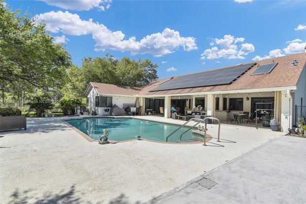 Exterior, Pool, Solar Panels