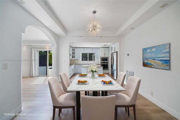 Chandelier, Dining room, Interior, Kitchen, Recessed Lighting, Stainless Steel Appliances, Wood Texture Flooring