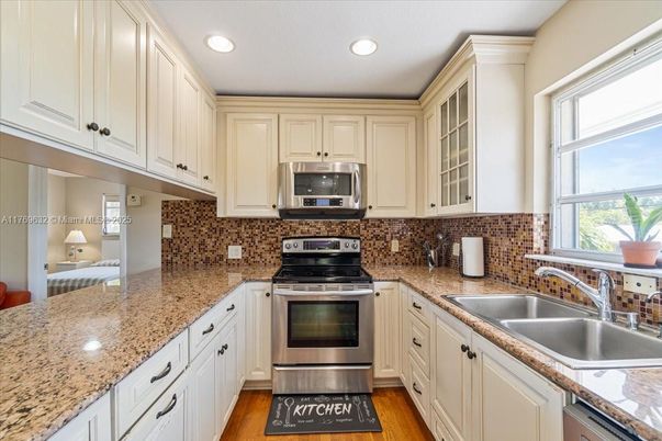 Interior, Kitchen, Recessed Lighting, Stainless Steel Appliances, Wood Texture Flooring