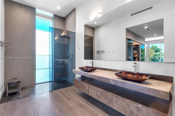 Bathroom, Dual Sink Vanities, Glass Shower, Interior, Recessed Lighting, Wood Texture Flooring