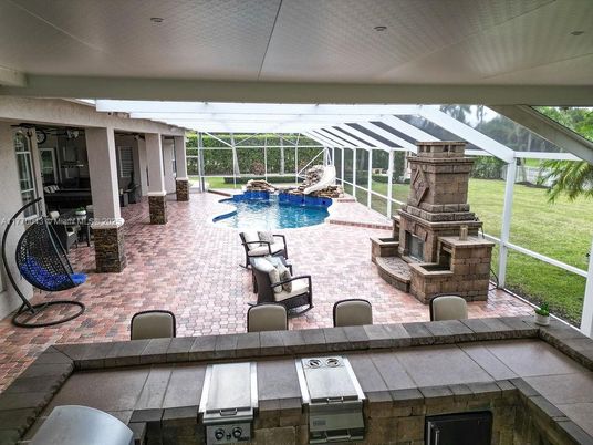 Fireplace, Glass Ceilings, Interior, Pool, Sun Room