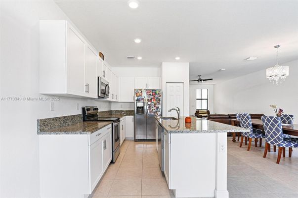 Chandelier, Dining room, Interior, Kitchen, Recessed Lighting, Stainless Steel Appliances
