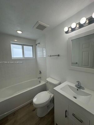 Bathroom, Dual Sink Vanities, Interior, Recessed Lighting, Wood Texture Flooring