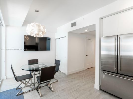 Dining room, Interior, Kitchen, Pendant Lights, Recessed Lighting, Stainless Steel Appliances, Wood Texture Flooring