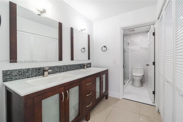 Bathroom, Dual Sink Vanities, Glass Shower, Interior, Marble, Marble Walls