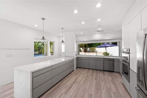 Interior, Kitchen, Pendant Lights, Recessed Lighting, Stainless Steel Appliances, Wood Texture Flooring