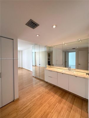 Bathroom, Dual Sink Vanities, Interior, Recessed Lighting, Wood Texture Flooring