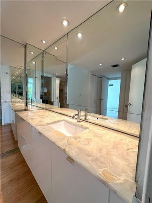 Bathroom, Dual Sink Vanities, Interior, Recessed Lighting, Wood Texture Flooring