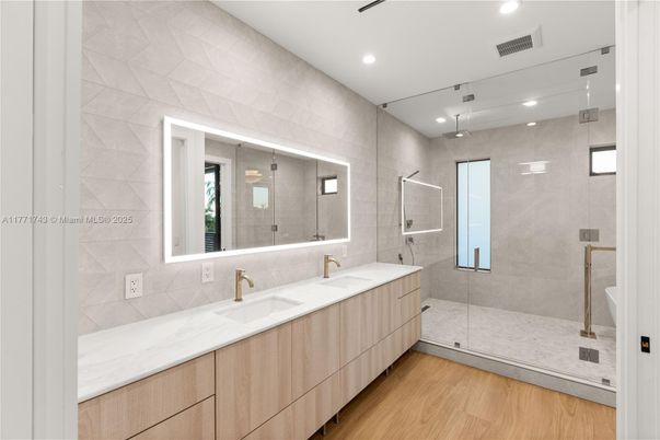 Bathroom, Dual Sink Vanities, Glass Shower, Interior, Recessed Lighting, Wood Texture Flooring