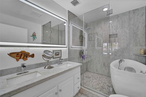 Bathroom, Dual Sink Vanities, Free Standing Baths, Glass Shower, Interior, Marble Walls