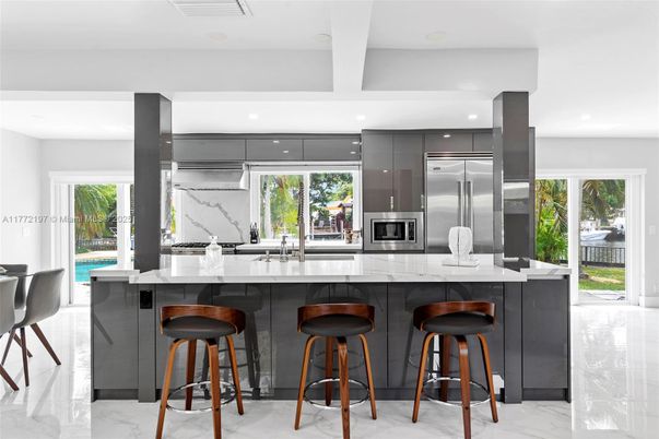 Interior, Kitchen, Marble, Marble Walls, Recessed Lighting, Stainless Steel Appliances