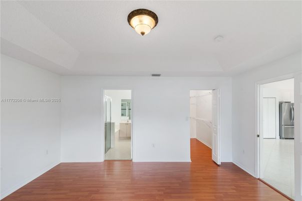 Empty room, Interior, Kitchen, Stainless Steel Appliances, Wood Texture Flooring