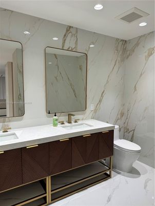 Bathroom, Dual Sink Vanities, Interior, Marble, Marble Walls, Recessed Lighting