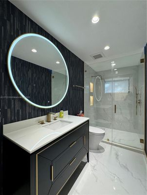 Bathroom, Dual Sink Vanities, Glass Shower, Interior, Marble, Marble Walls, Recessed Lighting