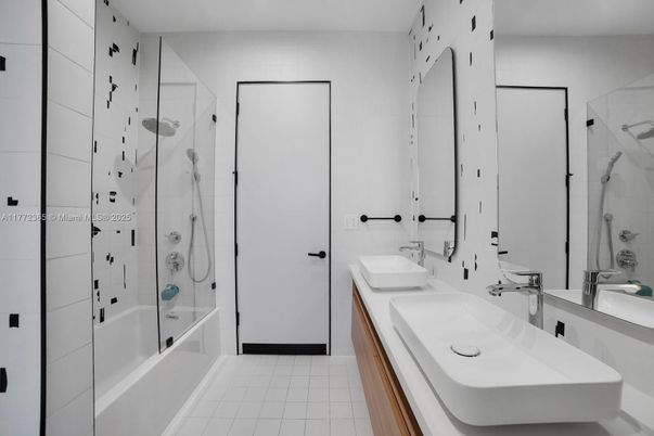 Bathroom, Dual Sink Vanities, Glass Shower, Interior, Recessed Lighting, Tile Countertops