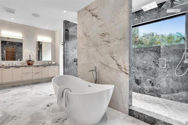 Bathroom, Dual Sink Vanities, Free Standing Baths, Glass Shower, Interior, Marble, Marble Walls, Recessed Lighting