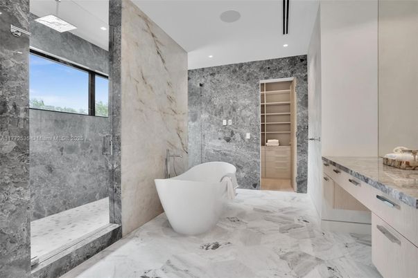 Bathroom, Free Standing Baths, Glass Shower, Interior, Marble, Marble Walls, Recessed Lighting