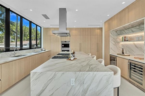 Interior, Kitchen, Marble Walls, Recessed Lighting, Stainless Steel Appliances