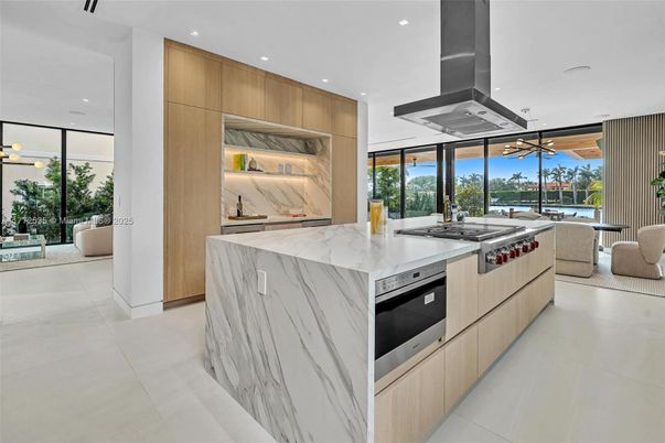 Interior, Kitchen, Marble Walls, Pendant Lights, Recessed Lighting, Stainless Steel Appliances