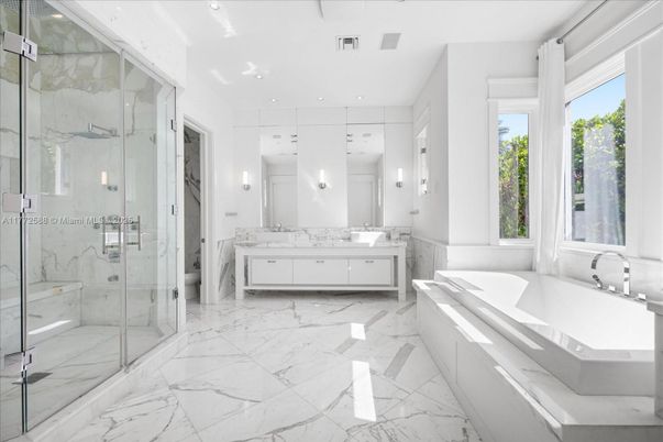 Bathroom, Dual Sink Vanities, Glass Shower, Interior, Marble, Marble Walls, Recessed Lighting