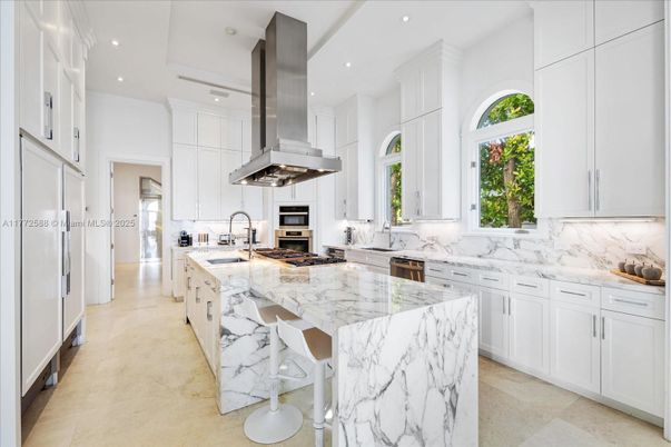 Interior, Kitchen, Marble Walls, Recessed Lighting, Stainless Steel Appliances