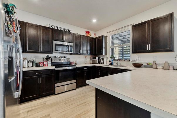 Interior, Kitchen, Recessed Lighting, Stainless Steel Appliances, Wood Texture Flooring