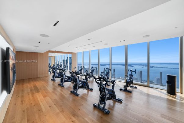 Fitness Equipment, Gym, Interior, Recessed Lighting, Water, Wood Texture Flooring
