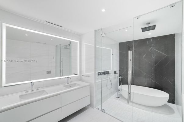 Bathroom, Dual Sink Vanities, Glass Shower, Interior, Marble Walls, Recessed Lighting