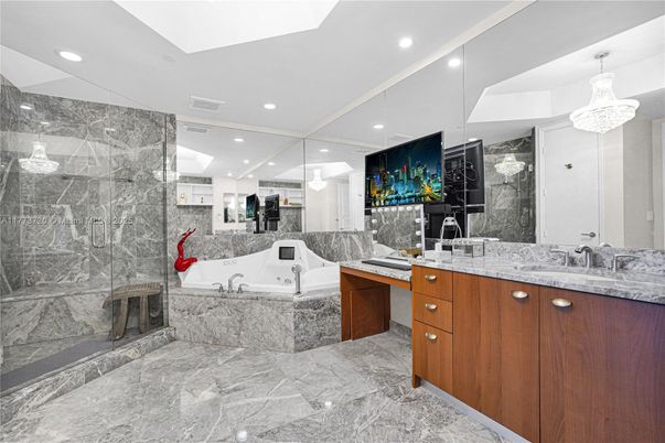Bathroom, Dual Sink Vanities, Glass Shower, Interior, Marble, Marble Walls, Recessed Lighting