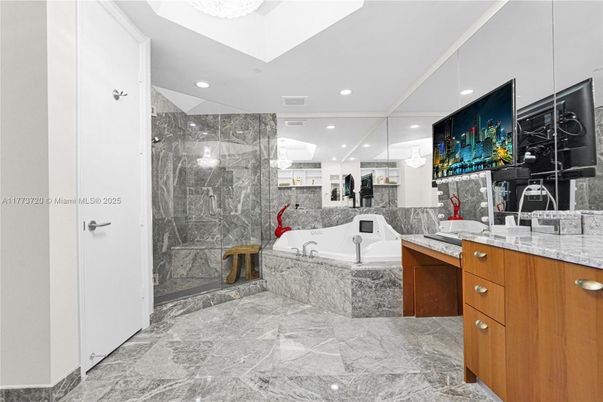 Bathroom, Dual Sink Vanities, Glass Shower, Interior, Marble, Marble Walls, Recessed Lighting