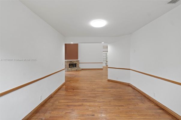 Empty room, Fireplace, Interior, Recessed Lighting, Wood Texture Flooring