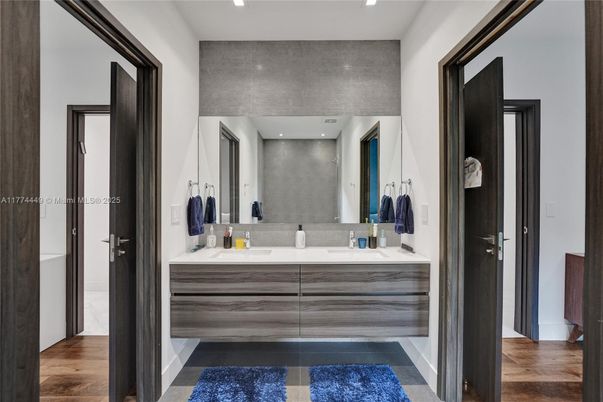 Bathroom, Dual Sink Vanities, Interior, Recessed Lighting, Wood Texture Flooring