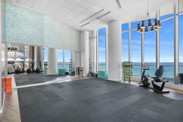 Fitness Equipment, Gym, Interior, Pendant Lights, Recessed Lighting, Water, Wood Texture Flooring