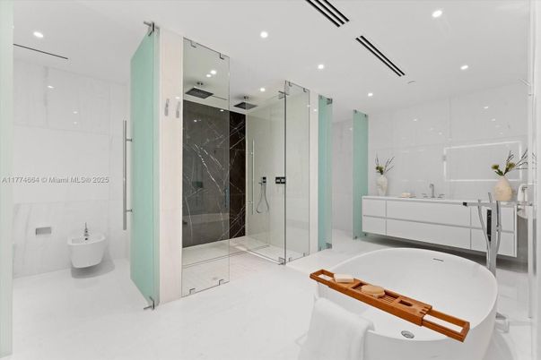 Bathroom, Free Standing Baths, Glass Shower, Interior, Marble Walls, Recessed Lighting