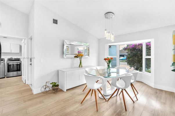 Dining room, Interior, Kitchen, Pendant Lights, Stainless Steel Appliances, Wood Texture Flooring