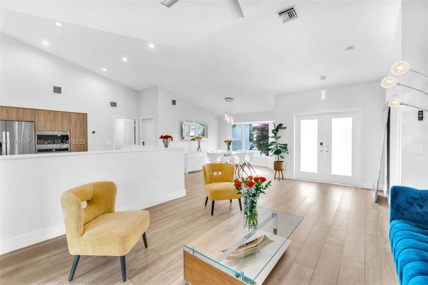 Dining room, Interior, Kitchen, Living room, Pendant Lights, Recessed Lighting, Stainless Steel Appliances, Wood Texture Flooring