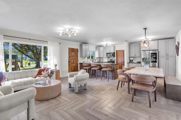 Dining room, Interior, Kitchen, Living room, Pendant Lights, Stainless Steel Appliances, Wood Texture Flooring