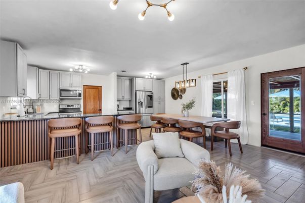 Dining room, Interior, Kitchen, Pendant Lights, Stainless Steel Appliances, Wood Texture Flooring