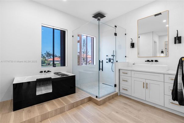 Bathroom, Dual Sink Vanities, Glass Shower, Interior, Recessed Lighting, Wood Texture Flooring