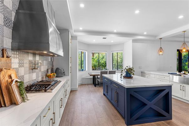 Dining room, Interior, Kitchen, Pendant Lights, Recessed Lighting, Stainless Steel Appliances, Wood Texture Flooring